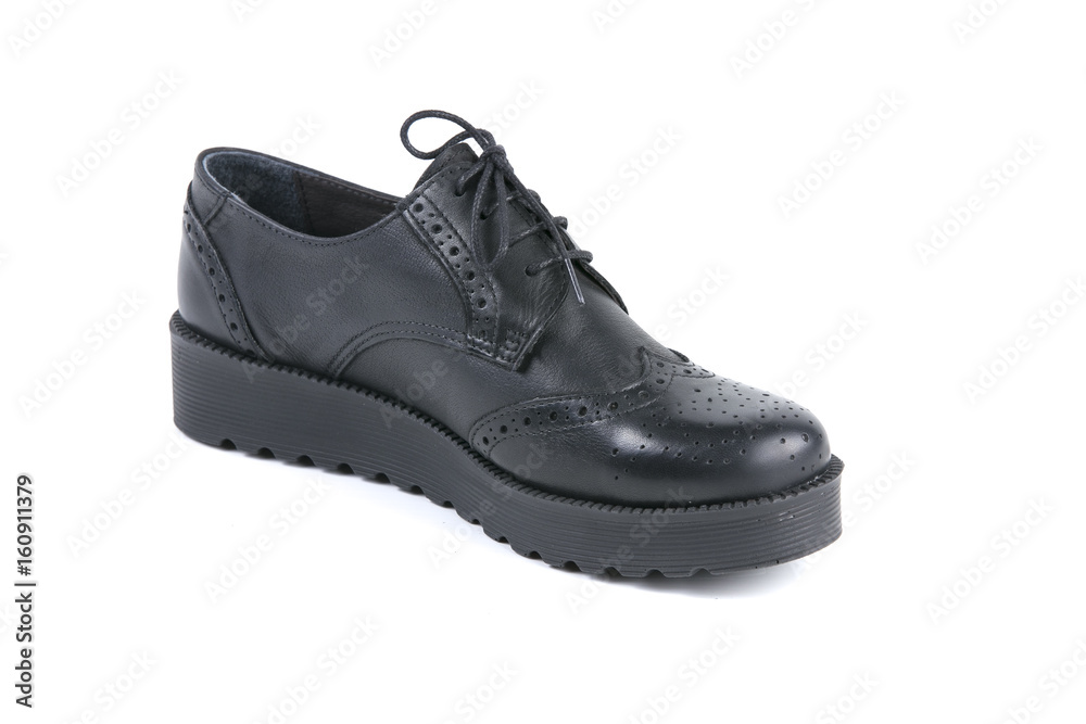 Black Shoe on White Background, Isolated Product, Top View, Studio. Black Shoe on White Background, Isolated Product, Top View, Studio.