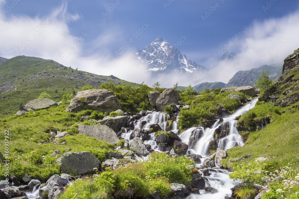 The first waterfalls of the great river Po' under the Monviso, Crissolo, Po' Valley, Cuneo District, Piedmont, Italy. The first waterfalls of the great river Po' under the Monviso, Crissolo, Po' Valley, Cuneo District, Piedmont, Italy.