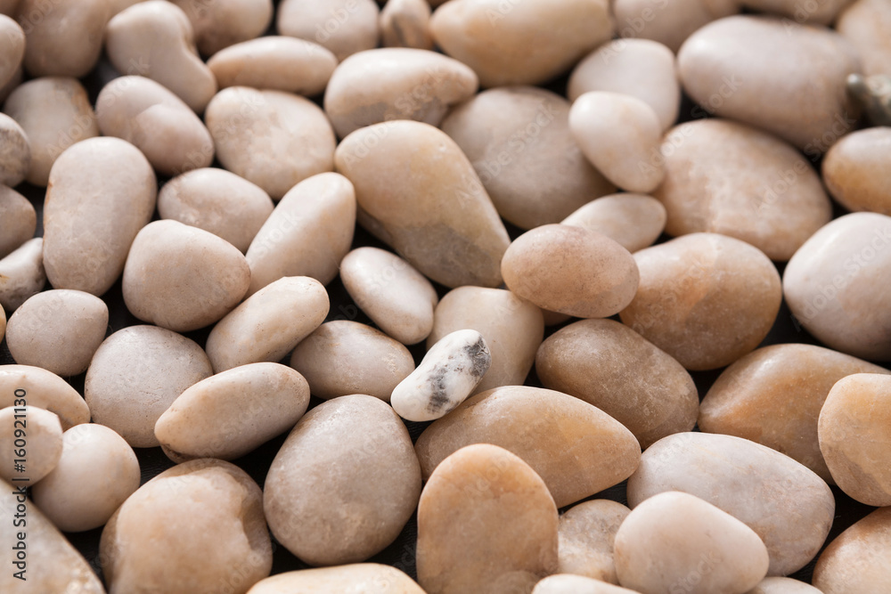 Sea pebbles background, natural seashore stones Sea pebbles background, natural seashore stones