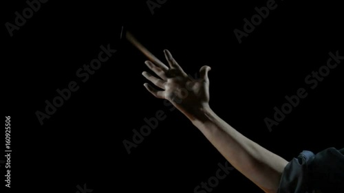 Drum Stick Twirl, Isolated on Black