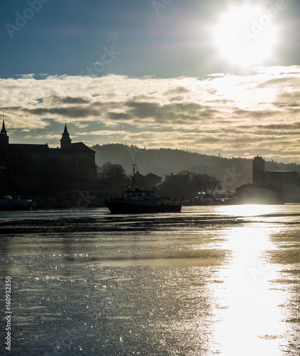 Photography A frozen fjord and castle in Oslo