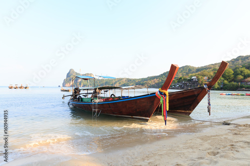 Long tail boats at beach at Koh Phi Phi, Thailand at sunrise © Jochen Netzker