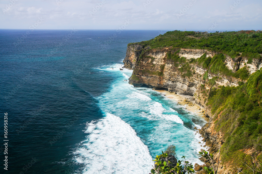 The cliffs and the ocean near the Uluwatu Temple on Bali, Indonesia.