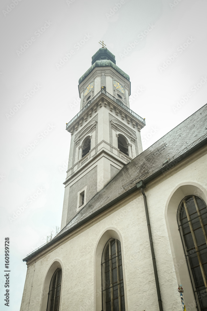 Fototapeta premium A low angle view of St Georges Church belfry in Freising, Germany.