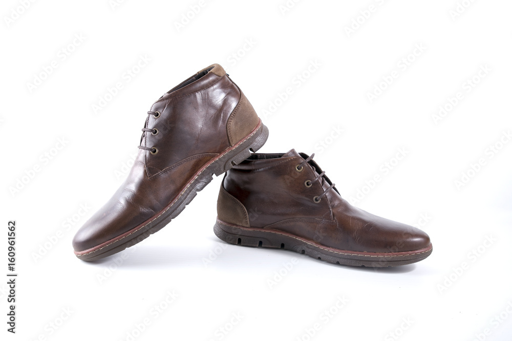 Male Brown Boot on White Background, Isolated Product, Top View, Studio.
Male Brown Boot on White Background, Isolated Product, Top View, Studio.