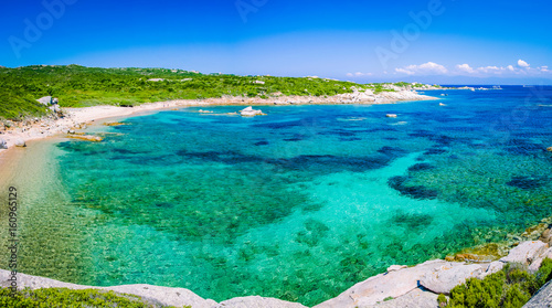 Lonely bay with azure water near Porto Pollo, Sardinia island, Italy