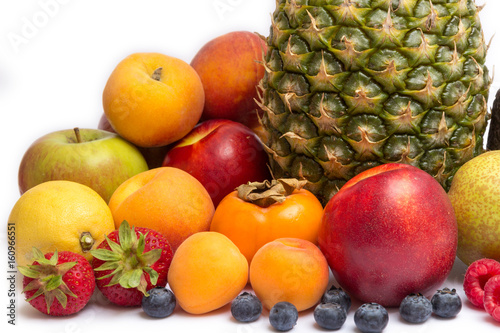 Assortment of fresh fruits isolated on white