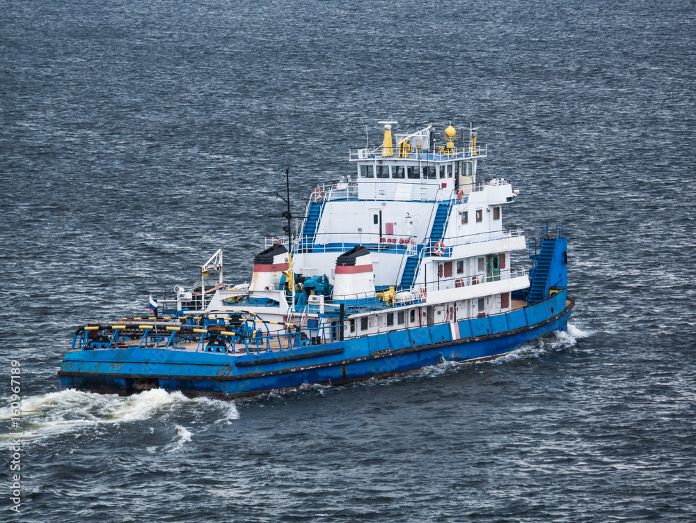 the old tugboat ship is on the river the old tugboat ship is on the river