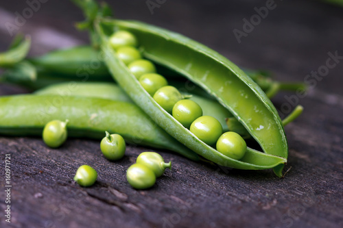 Young organic green pea, close up.