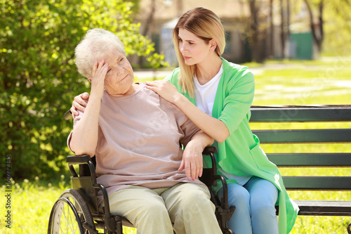 Disabled elderly woman and ...