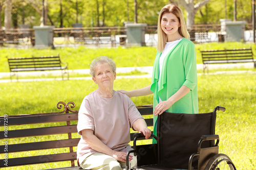 Disabled elderly woman and ...