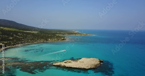 Landscape of a transparent clear blue Mediterranean Sea. The island of Cyprus. Resort. blue lagoon Yacht