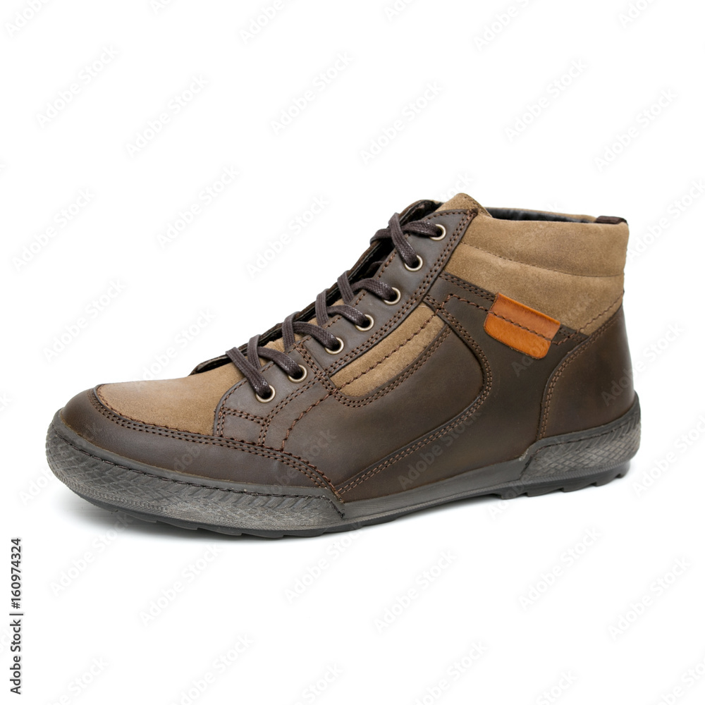 Male Brown Boot on White Background, Isolated Product, Top View, Studio. Male Brown Boot on White Background, Isolated Product, Top View, Studio.