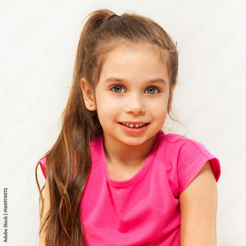 Portrait of smiling brunette seven years old girl Portrait of smiling brunette seven years old girl