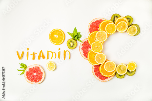 Fototapeta Naklejka Na Ścianę i Meble -  Vitamin C letters made of citrus fruits