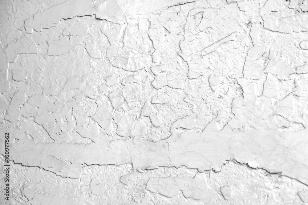 abstract white background with cracks in the paint. Texture. The horizontal frame.