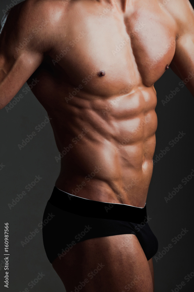 man with muscular body in underwear pants