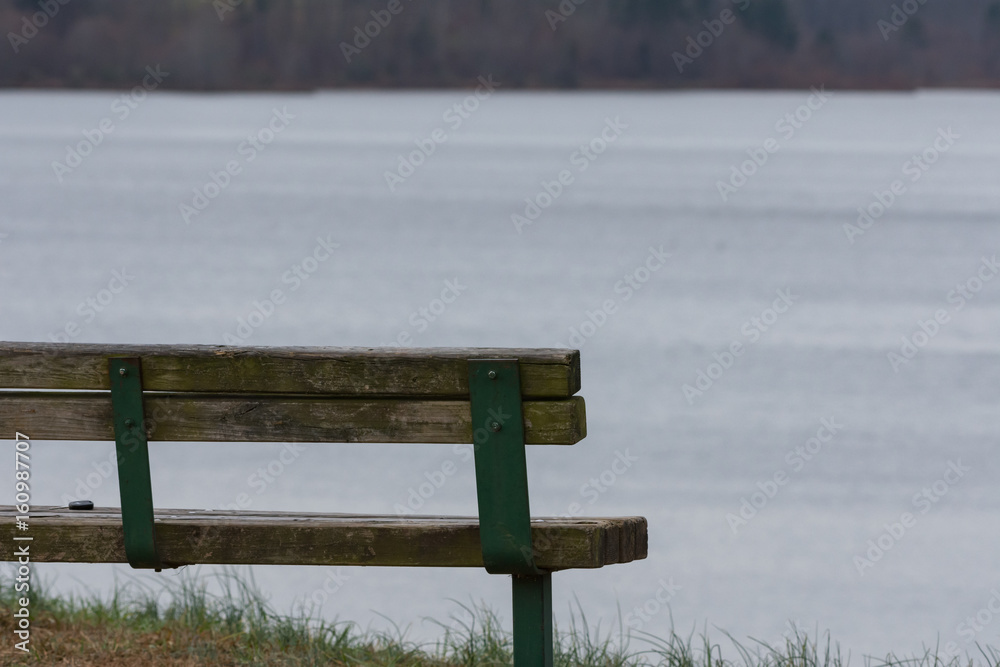 Sit, breathe, and practice mindfulness on a relaxing bench by the water