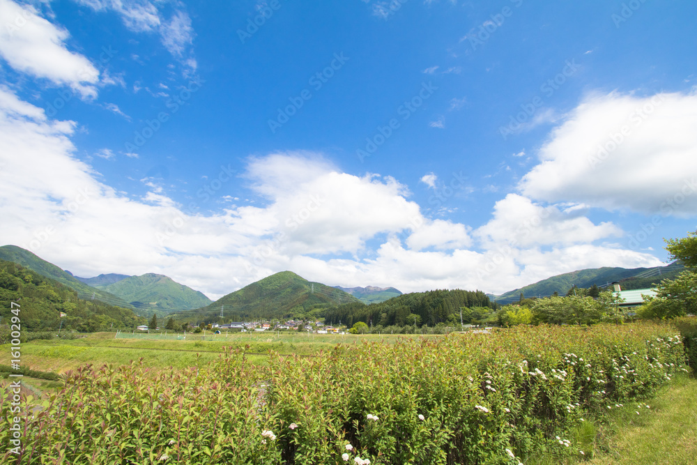 Beautiful landscape of Takayama mura at sunny summer or spring day and blue sky in Kamitakai District in northeast Nagano