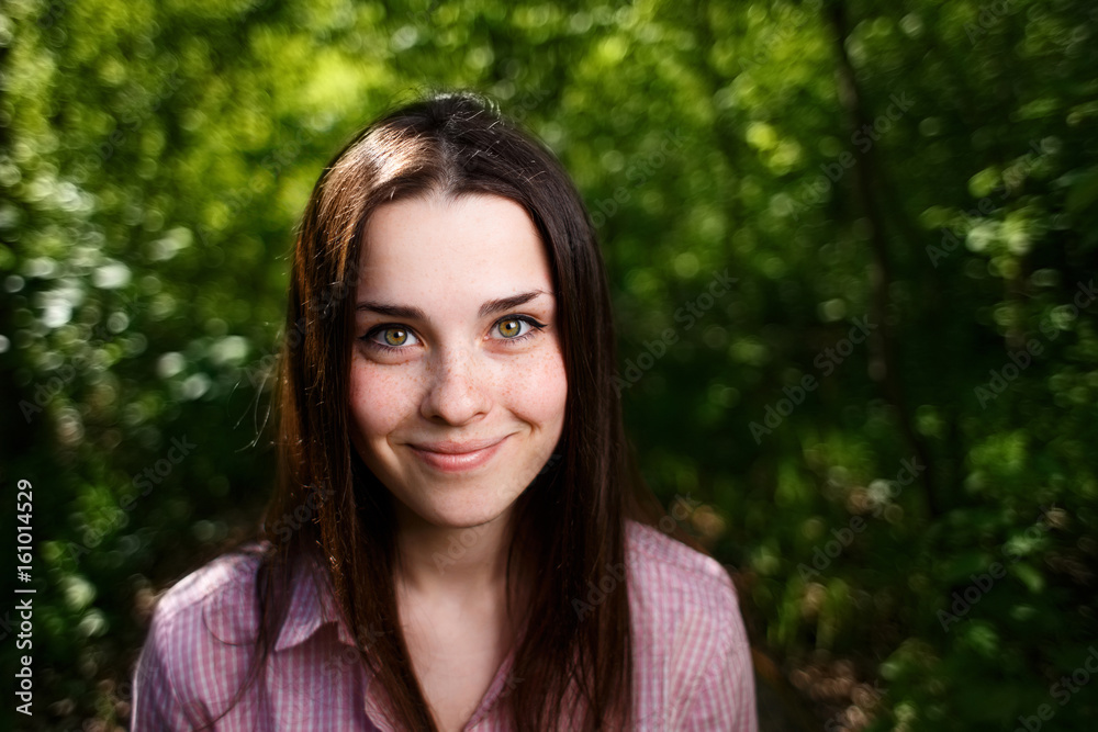 Portrait of cheerful smiling cute young woman with long hair and healthy skin Portrait of cheerful smiling cute young woman with long hair and healthy skin