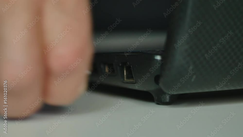 Elderly Man Hand Disconnect Internet Lan Cable To Laptop Elderly Man Hand Disconnect Internet Lan Cable To Laptop