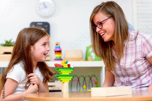 Mother with creative kid having fun time together