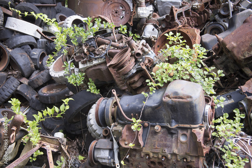 Rusting scrap metal in junkyard