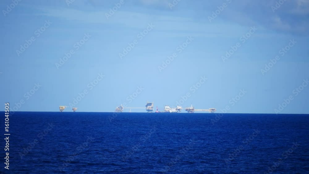 Central processing platform (cpp) in the middle of the ocean on sunny day - upstream industry Central processing platform (cpp) in the middle of the ocean on sunny day - upstream industry