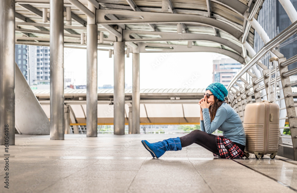 Fototapeta premium problem with transportation, delay of flight, depressed woman