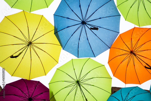 Colorful umbrellas in the sky retro styled