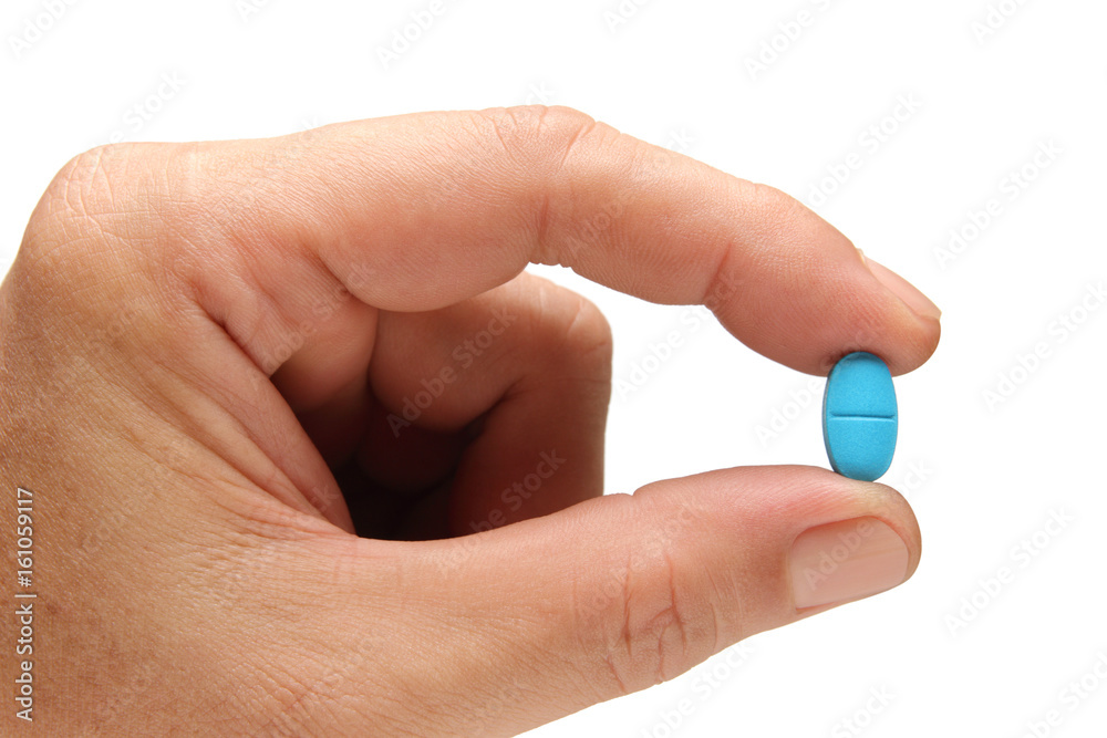 medicine in finger of man hand isolated on white background
medicine in finger of man hand isolated on white background