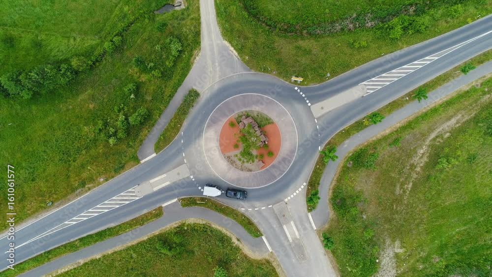 Traffic circle, roundabout and traffic - aerial view