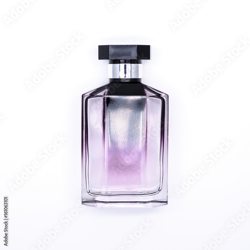 Closeup of a purple bottle perfume isolated on white background.