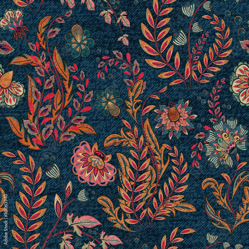 Blue denim with colorful floral print. Vector seamless wallpaper.