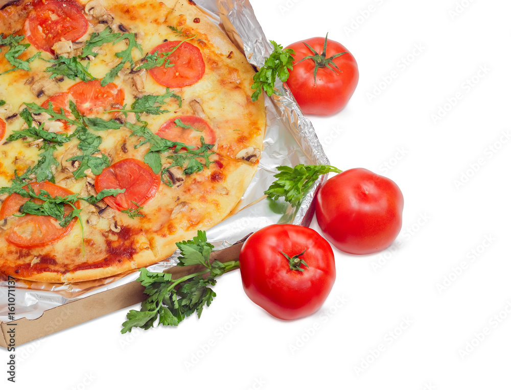 Fragment of cooked pizza in cardboard box and tomatoes Fragment of cooked pizza in cardboard box and tomatoes