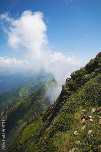 Mountain in Sochi, clouds and river © pavelvozmischev