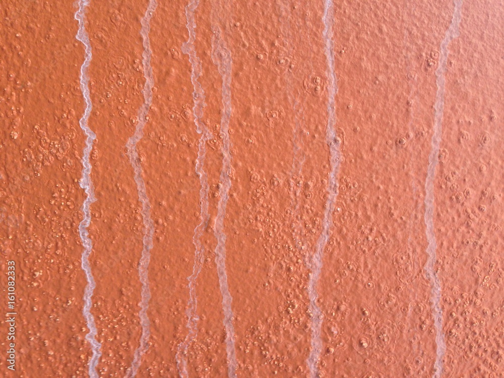 Fototapeta premium Dirty old orange cement wall texture for background