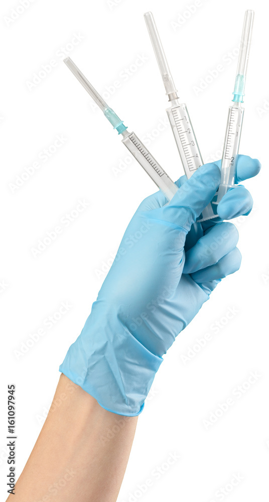Syringe in hand isolated on white Syringe in hand isolated on white