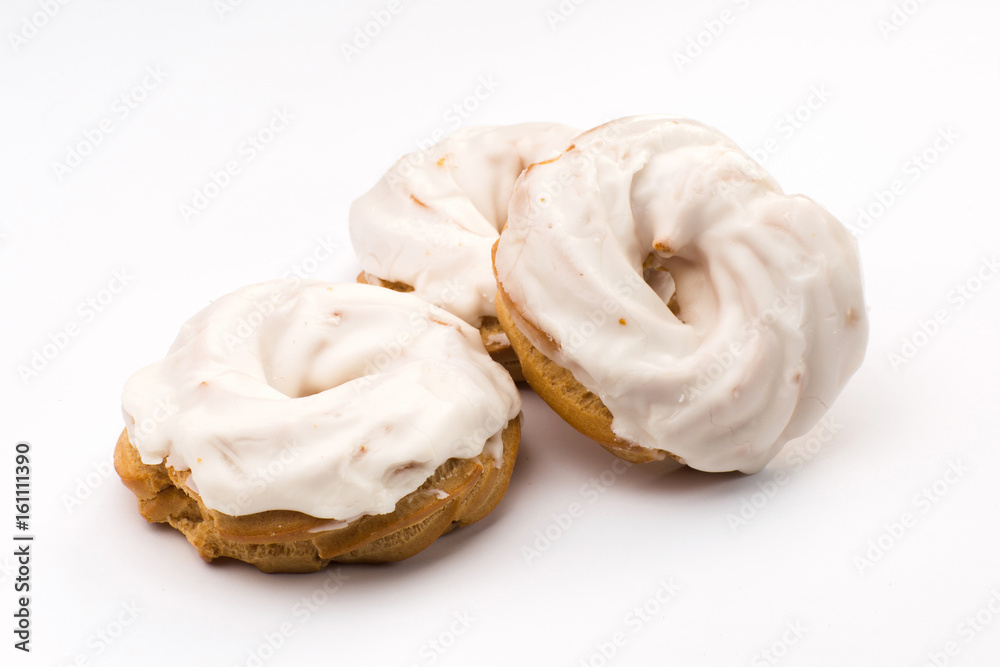 custard rings in white glaze with cream custard rings in white glaze with cream