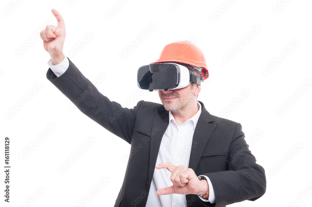 Foreman gesturing wearing virtual reality goggles and hardhat Foreman gesturing wearing virtual reality goggles and hardhat
