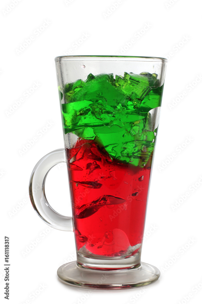 Fruit cocktail in a glass goblet on a white background Fruit cocktail in a glass goblet on a white background