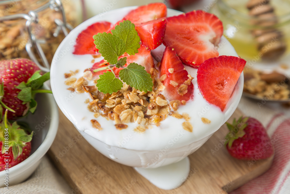 Breakfast - yogurt with granola and straberries