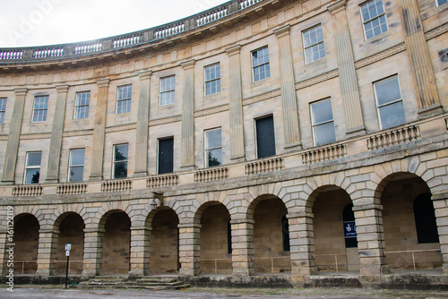 The arches and windows of Buxton Crescent, Buxton, Derbyshire