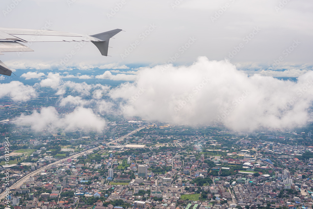 A cityscape view from the airplane window. A cityscape view from the airplane window.