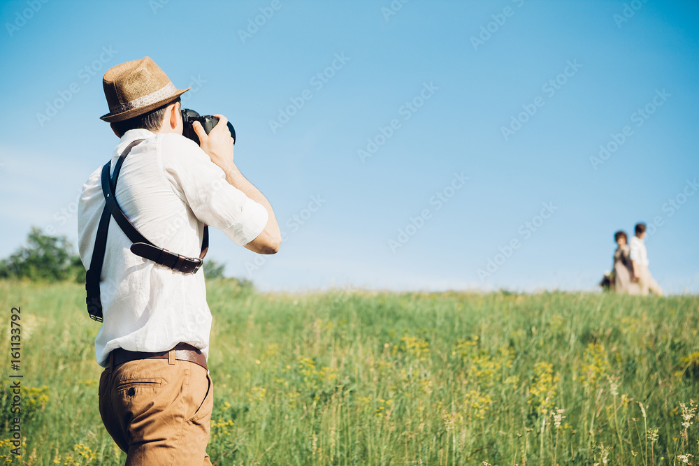 wedding photographer takes pictures of bride and groom in nature, fine art photo wedding photographer takes pictures of bride and groom in nature, fine art photo