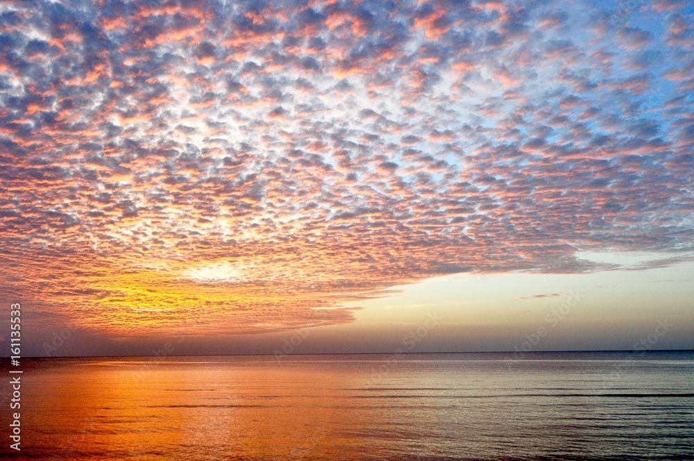 beautiful blue sky with clouds background.Sky clouds and sea, Sky with clouds weather nature cloud blue, Sky background on sunset, sunset at sea. variety of colors and hues of the rising sun beautiful blue sky with clouds background.Sky clouds and sea, Sky with clouds weather nature cloud blue, Sky background on sunset, sunset at sea. variety of colors and hues of the rising sun
