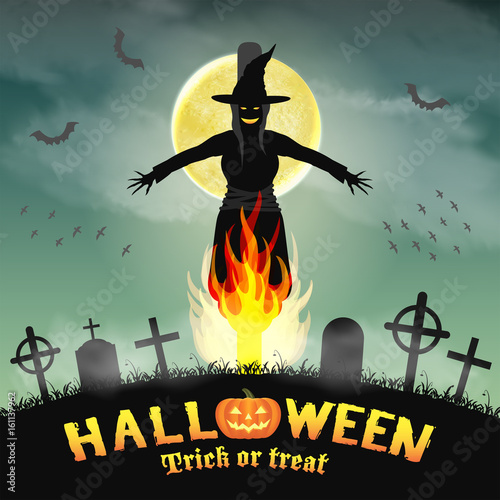 halloween burning witch in a night graveyard