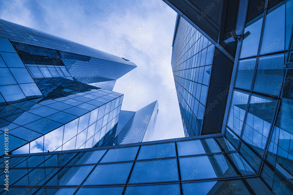 Obraz premium Business and finance centerwith skyscrapers in blue tones