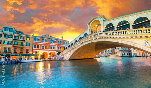 Bright charming panoramic landscape Rialto Bridge in Venice, Italy, Europe, at sunset © anko_ter