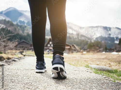 Woman legs Hiking Trail Mountain landscape Outdoor Lifestyle Travel adventure